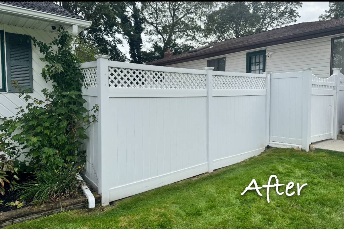 A clean Long Island vinyl fence after a professional pressure and soft washing by Hydro Bros Pro Wash